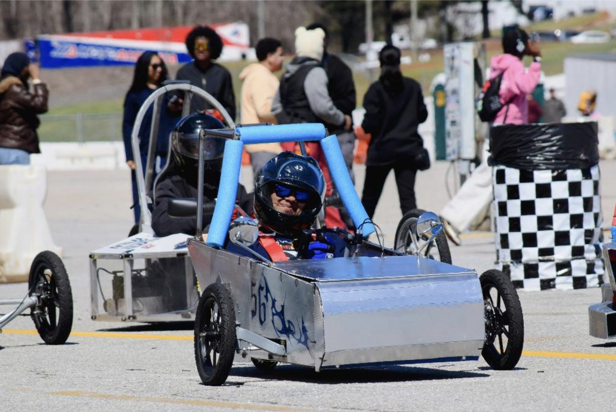 Students racing electric vehicles at an Electrathon America event